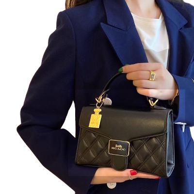 China Fashion own designs trending spot handbags collection 2022 genuine leather purses and women handbags ladies for sale