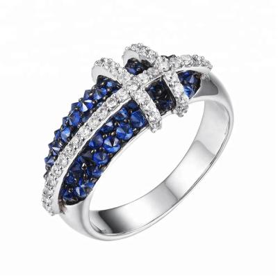 China CLASSIC Made In Silver CZ Ring Porcelain 925 Women Jewelry Cross Ring Light Blue Sapphire Stone Ring for sale