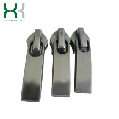 China Nickel Free 7# Automatic Lock High Quality Custom Clothes Nylon Zipper Slider Puller for sale