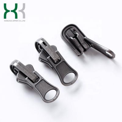 China Other Fashion Style Reversible Black Nickel Plastic Zipper Slider for sale