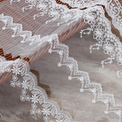 China Viable Wholesale High Quality French Silk Bridal Lace Fabric Fashion White Lace Trimming for sale