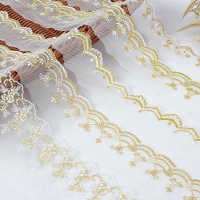 China 2023 viable wholesale cheap ribbon mesh lace hollow out embroidery lace gold trimming for sale