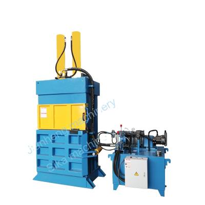 China Waste Paper Vertical Double Cylinder Waste Plastic Baler Machine for sale