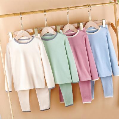 China Color Design Thermal Simple Long Sleeve Kids Sleepwear Warm Pajama Sets 2pc For Boys Girls for sale