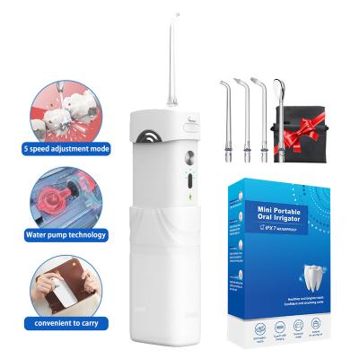 China 4 Palm Spout Water Irrigator Pengairan Mulut Electric Water Flosser Variable Size Dental Cordless Portable Teeth With 4 Pcs Replaced Nozzles for sale