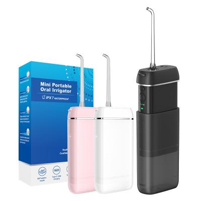 China IPX7 Waterproof Portable Dental Water Flosser Teeth Cleaning Machine Cordless Induction Charging Oral Irrigator for sale