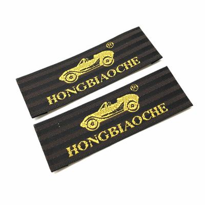 China Custom Label Clothing Bag Handbag Cloth Maternity Brand Washable Engraved Label Plastic Logo For Shorts Fashion Shoes Gold OEM for sale