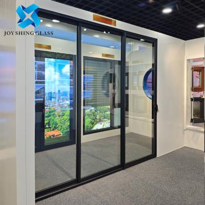 China Horizontal Sliding UPVC Door Double Glazed Door for sale