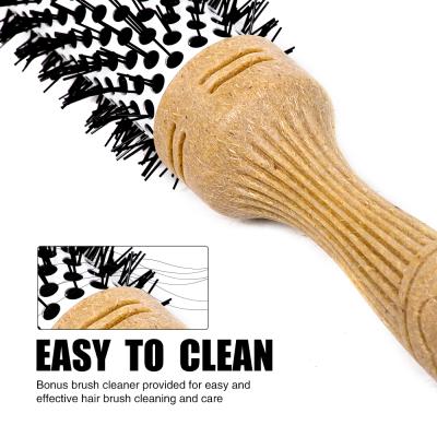 China Salon Barrel Hair Brush Boar Bristle Thermal Ceramic Heating Ionic Round Hair Brush for sale