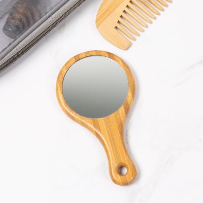 China Handheld Dressing Mirror Makeup Portable Bamboo Wooden Mirror Handle Magnifying Creative Production for sale