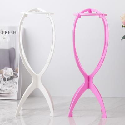 China 2021 Home Tripod Wig Stand Wholesale Plastic Stand for sale