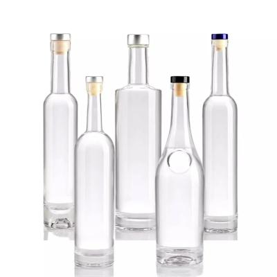 China Beverage Hot sale low MOQ 700ml 750ml vodka spirit glass bottle custom 500ml  whisky gin tequila  liquor bottle with wooden cork for sale