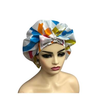 China OEM Printed Polyester 210D Bath Shower Cap Waterproof Hair Bonnet for sale