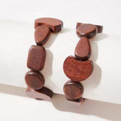 China New Fashion BOHEMIA Bohemian Wooden La madera hout wooden legno beads coffee color designer Women Jewelry Custom elastic bracelets for sale