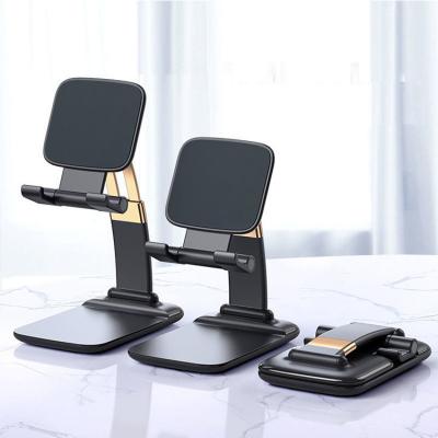 China Design Desktop Gravity Fit Mobile Phone Foldable Folding Auto Lift Stand for iPhone Samsung Xiaomi for iPad for sale