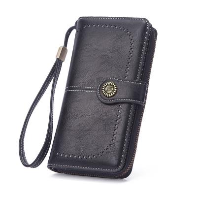 China Hot Selling RFID Females Clutches Wallet Women Wallet With Wristlet Zipper Long Coin Bag Leather Cell Phone Fashion for sale