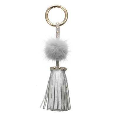 China Personalized creative gift Leather+mink hair mink hair rivet tassel key chain bag PENDANT GIFT car key chain PENDANT for sale