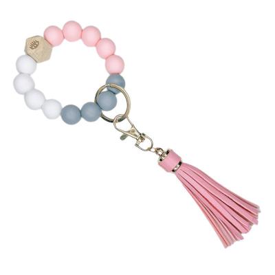 China New Food Grade Silicone Bead Wristband Anti Loss Wristband Wooden Key Chain Keychain Key Chain Bracelet Key Chain for sale