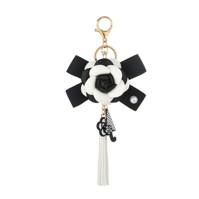 China Korean PU Tassel Bow Camellia Key Chain Leather Chain Camellia Rose Keychain Tassel Bowknot Rose Pearl Car Pendant Keychain for sale