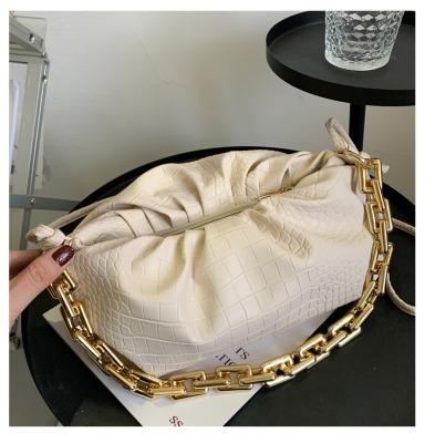 China 2022 new fashion bag one shoulder crocodile pattern armpit alien bag shape cloud thick chain wrinkled bag for sale