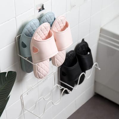 China Sustainable Home Bathroom Dorm Shoe Storage Artifact Free Punching Door Behind Wall Mounted Bathroom Slippers Rack for sale