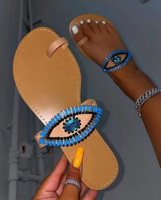 China Fashion Trend Wholesale New Arrival Rhinestone Evil Eye Flat Shoes Ring Toe Slips Women Casual Slippers for sale