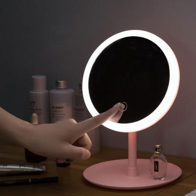 China LED Desktop Cosmetic Mirror Shine White And Pink Lighted Adjustable Round Shaped Single Sided Makeup Mirror for sale