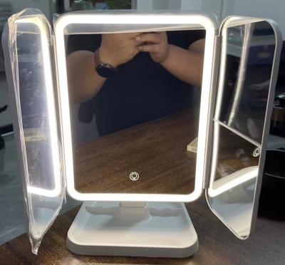 China Three Lighted Triple Mirror USB Charging 1X/2X/3X Magnification Women Desktop Foldable Gift Led Makeup Mirror for sale