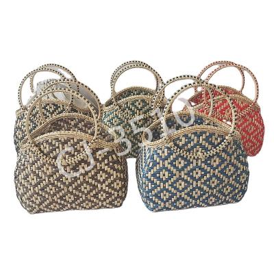 China NO.3510 Folk art rattan made handbag, twotone color rattan bag with round shape handle for sale