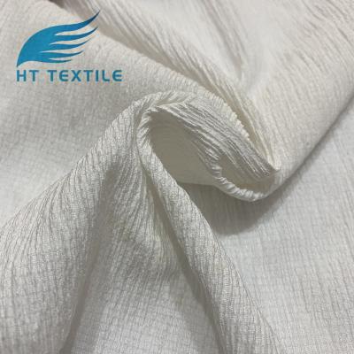 China Wholesale European fashion memory plain dyed texture yarn warp knitting fabric for women clothes for sale