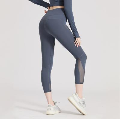 China Antibacterial drop shipping 2021 hot new high-waist mesh and elastic women's hip-lifting fishing leggings sports yoga pants women's leggings for sale