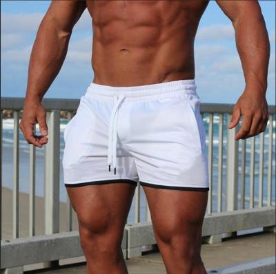 China QUICK DRY Mesh Shorts With Pockets Men's Gym Workout Shorts Summer Beach Running Training Quick Dry Three Point Shorts For Men for sale