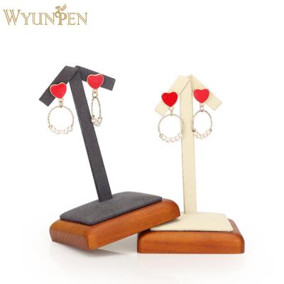 China Morden WYP Custom Logo Luxury Solid Wood Unique Rotating Jewelery Display Stand Earring Holder Jewelry Display for sale