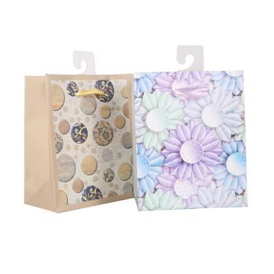 China Recycled Materials Good Quality Prices Elegant Suitable Newspaper Use Art Paper Foil High Grade Gift Bags For Gift With Satin Handle for sale