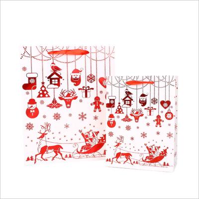 China Stock Color Bronzed Creative Candy Card White Gift Bag Recyclable Handheld Xmas Paper Bag Christmas Gift Bag for sale