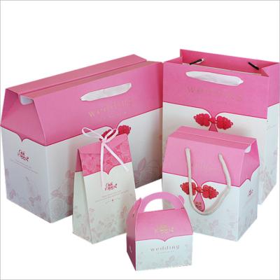 China Recycled Material Manufacturer Custom Wedding Supplies Handmade Gift Paper Bag Pink Wedding Roses Candy Box Large Small for sale