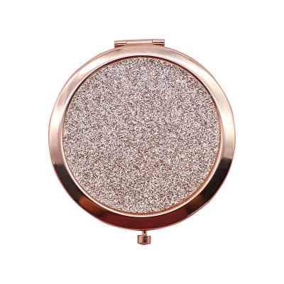 China Promotional Metal Glitter Rose Gold Plating Round Shape Personalized Gift Makeup Pocket Folding Portable Mirror for sale