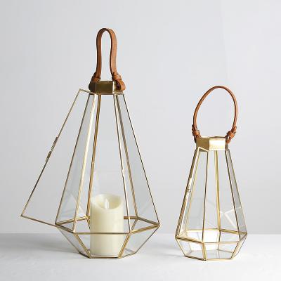 China Vintage Gold Hurricane Lantern Candlesticks Tea Holders European Safe Light Geometric Table Lantern Stocked Clear Glass Candle Holders for sale