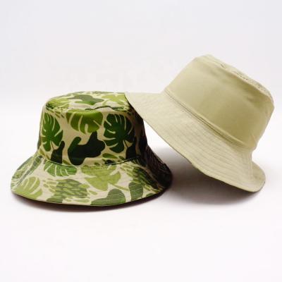 China Waterproof/Sun Protection/Gift/Promotion Leaves Pattern Double Sided Soft Cloth Kids Army Green Hats Wholesale Custom Bucket Hat for sale