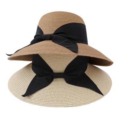 China Eco-friendly Hot Sale Ribbon Bowknot Packable Straw Bucket Sun Hats For Women Summer for sale