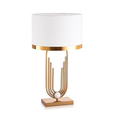 China Modern table lights for designer creative gold villa hotel restaurant decoration personality bedroom bedside table model lamp for sale