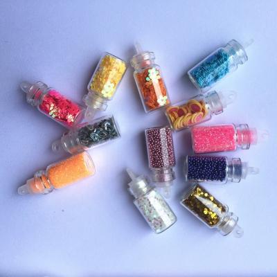 China Diversity 12 Color Set Glass Bottle Sparkle Glittery Glass Beads Shell Powder Mud DIY Jewelry Accessories for sale