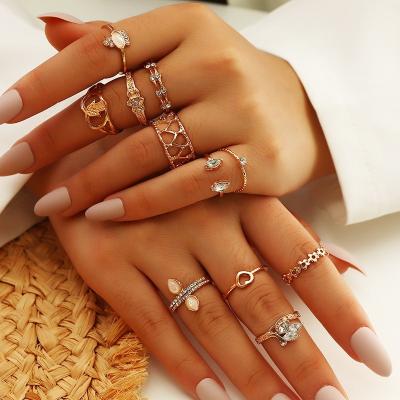 China Hot Selling CLASSIC 12 Piece Ring Set Women Geometric Hollow Heart Zircon Finger Knuckle Ring Set Jewelry for sale