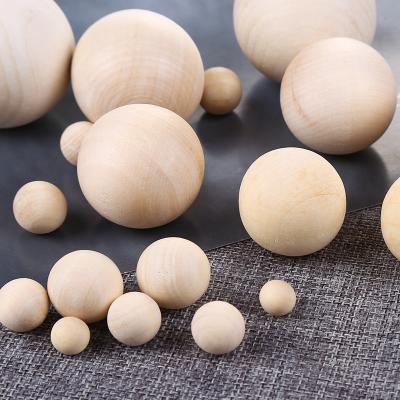 China DIY Material Stock Custom Round Ball 8mm 10mm 12mm 14mm 20mm 25mm 30mm Wholesale Natural Wood Beads Without Hole for sale