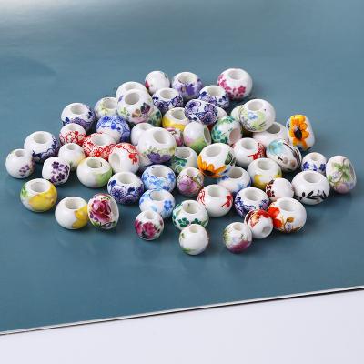 China DIY Jewelry Making 10mm Round Shape Wholesale Flower Modeling Colorful Fancy Porcelain Beads Ceramic Beads For Jewelry Making Supplier for sale