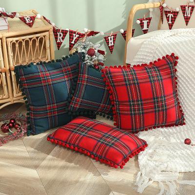 China Christmas Plaid Faux Wool Ball Air Permeable Sofa Cushion Festive Cushion Side Pillow for sale