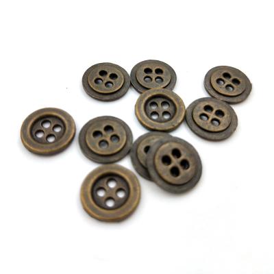 China Good Texture Magnetic Wholesale Brass Four Holes Round Buttons Metal Snap Sewing Button for sale