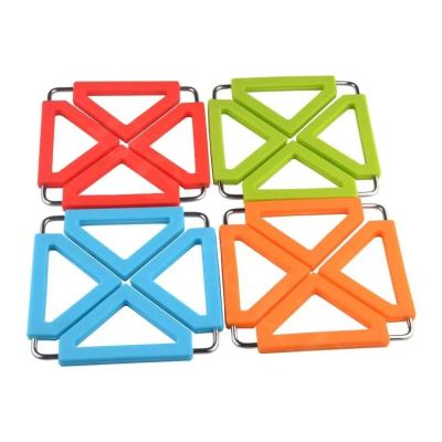 China Creative Stainless Steel Silicone Trivet Mat Trivet Silicone Pot Holder Kitchen Tripod Stand Table Heat Resistant Viable Silicone for sale