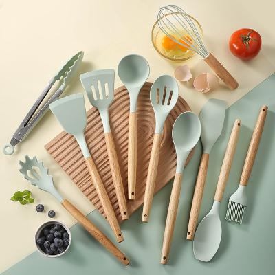 China Sustainable Non-Toxic Cooking Tools Kitchen Tableware Cocina Spatula Silicone Cookware Utensils Set With Wooden Handles for sale