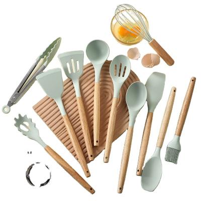 China Sustainable Non-Toxic Cooking Tools Kitchen Tableware Cocina Spatula Silicone Cookware Utensils Set With Wooden Handles for sale